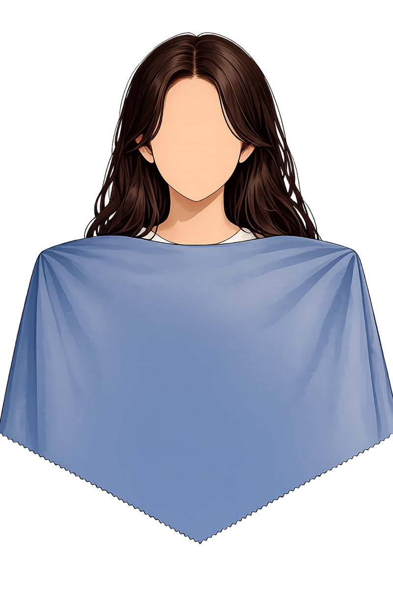 A person wearing an analysis drape, ready for a color reading